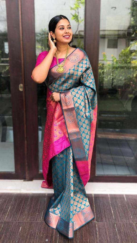 Peacock Blue and Rani Pink Silk Blend Saree with Gold Woven Motifs