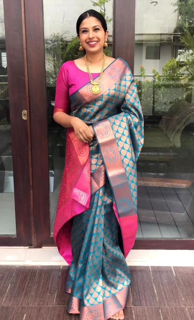 Peacock Blue and Rani Pink Silk Blend Saree with Gold Woven Motifs