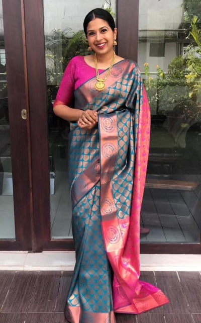 Peacock Blue and Rani Pink Silk Blend Saree with Gold Woven Motifs