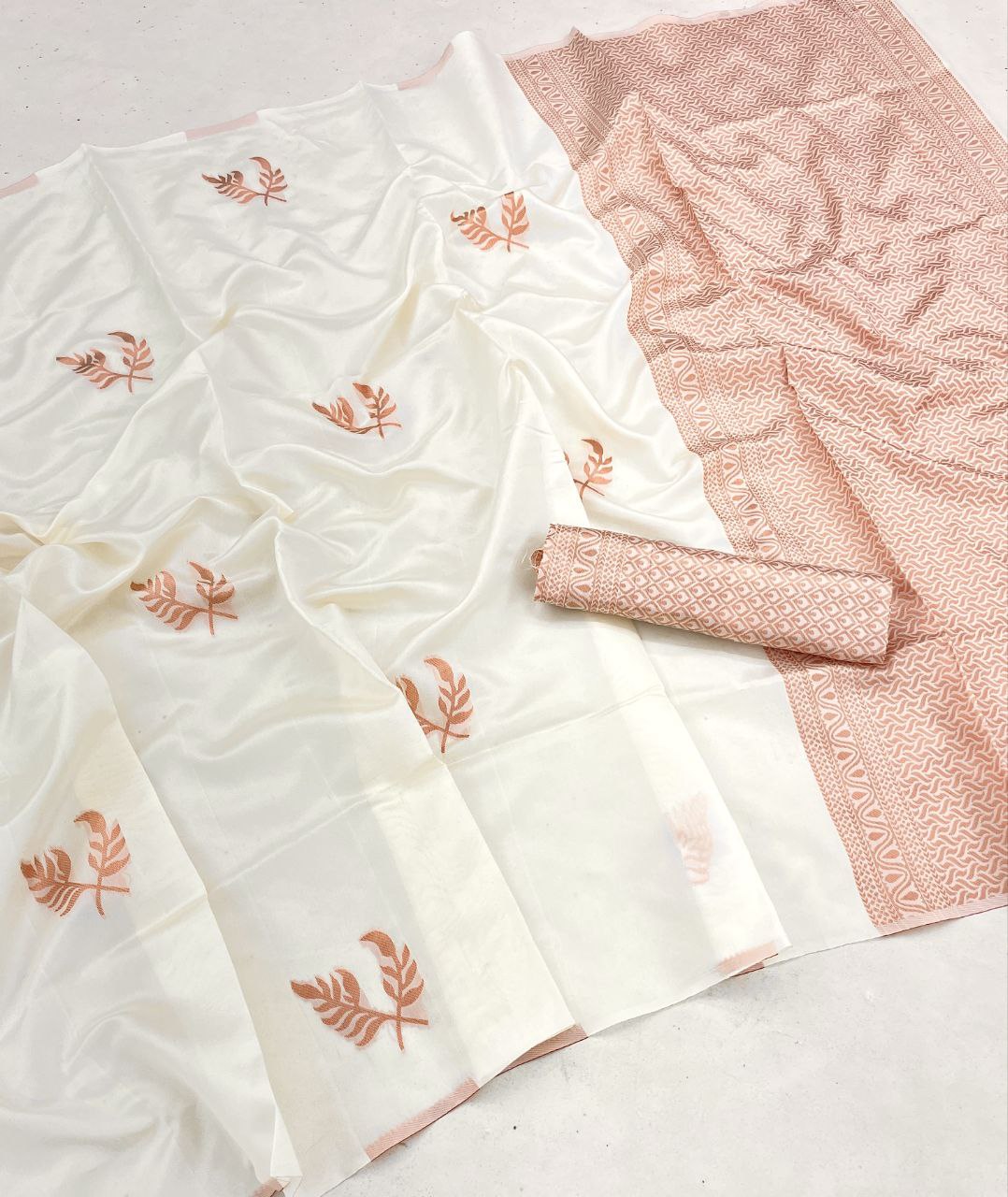 Ivory White Silk Blend Saree with Peach Leaf Motifs and Woven Pallu