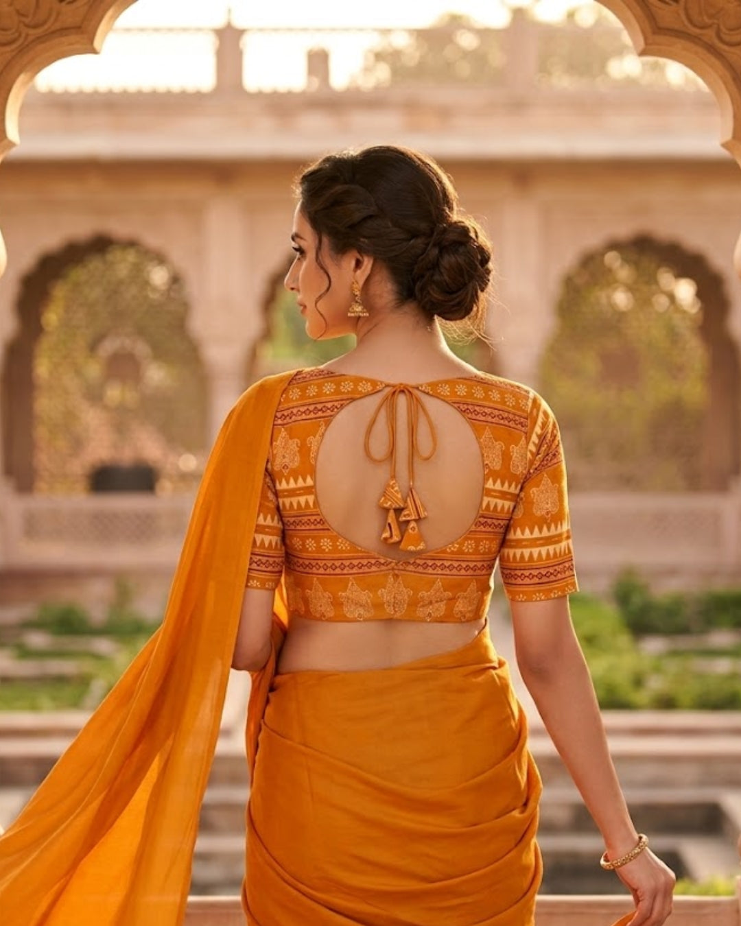 Mustard Orange Ethnic Printed Cotton Blouse with V-Neck & Elbow Sleeves for Women