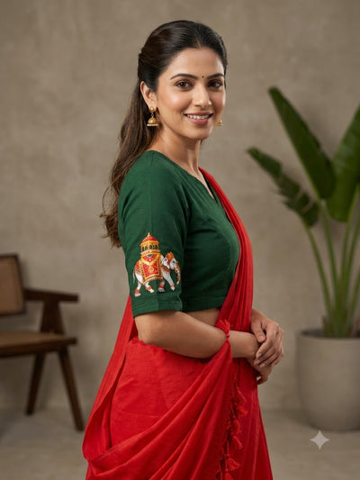 Elegant Red Saree with Embroidered Green Blouse & Tassel Pallu