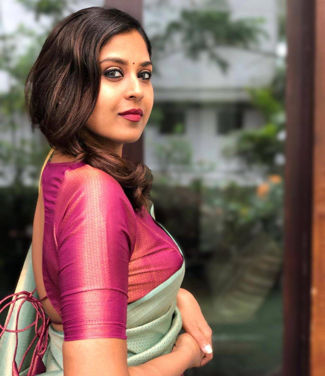 Sea Green Silk Blend Saree with Rani Pink Contrast Border and Woven Pallu