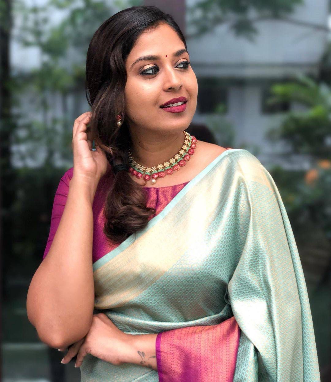 Sea Green Silk Blend Saree with Rani Pink Contrast Border and Woven Pallu