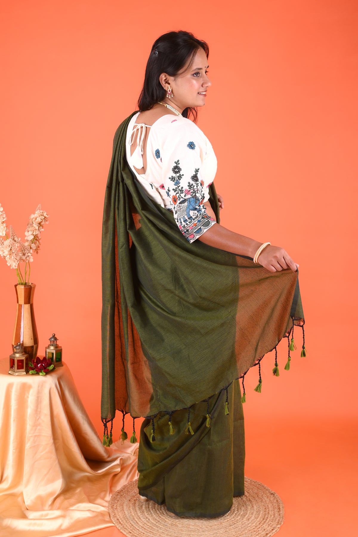 Olive Green Solid Saree with Tassel Pallu – Elegant Traditional Ethnic Wear