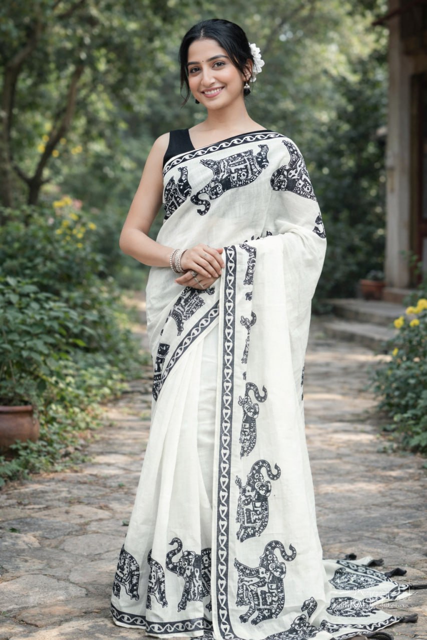Elegant Ivory Linen Saree with Black Elephant Print Border