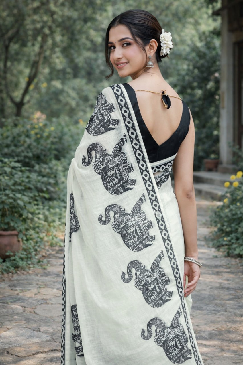 Elegant Ivory Linen Saree with Black Elephant Print Border