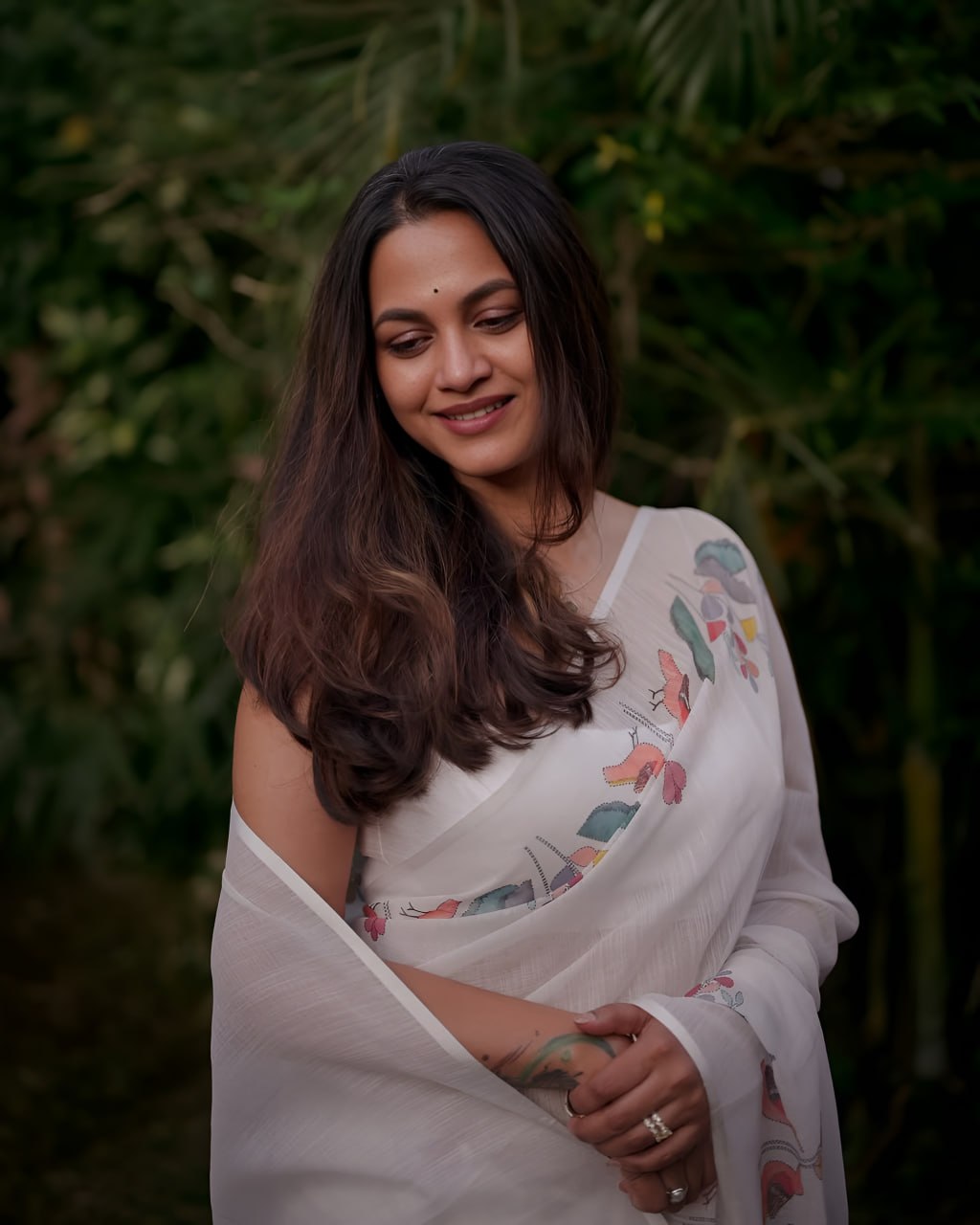 Elegant White Floral Printed Saree with Soft Pastel Border
