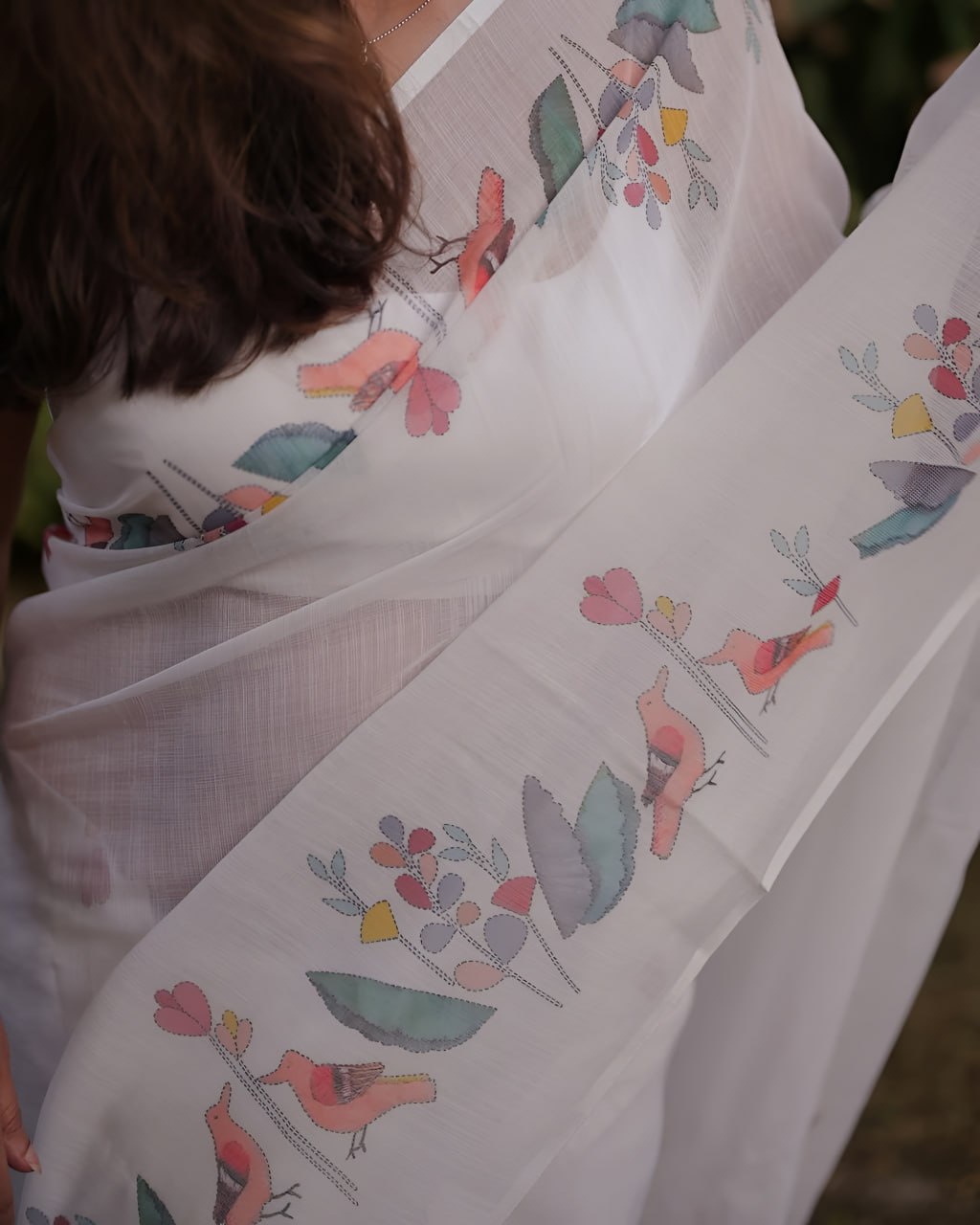 Elegant White Floral Printed Saree with Soft Pastel Border