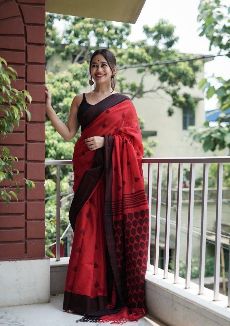 Bold Red Saree with Black Border & Traditional Motif Print