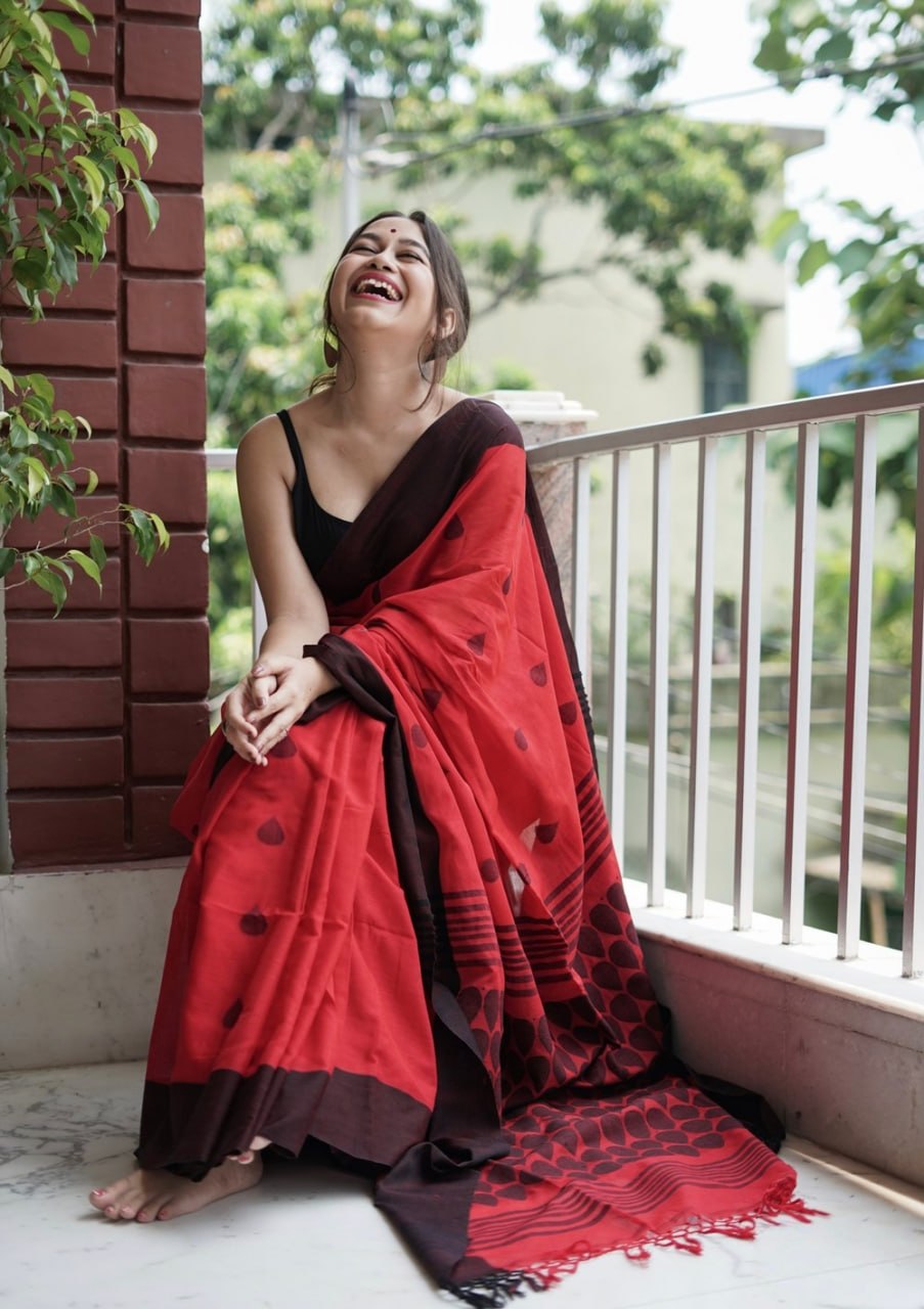 Bold Red Saree with Black Border & Traditional Motif Print