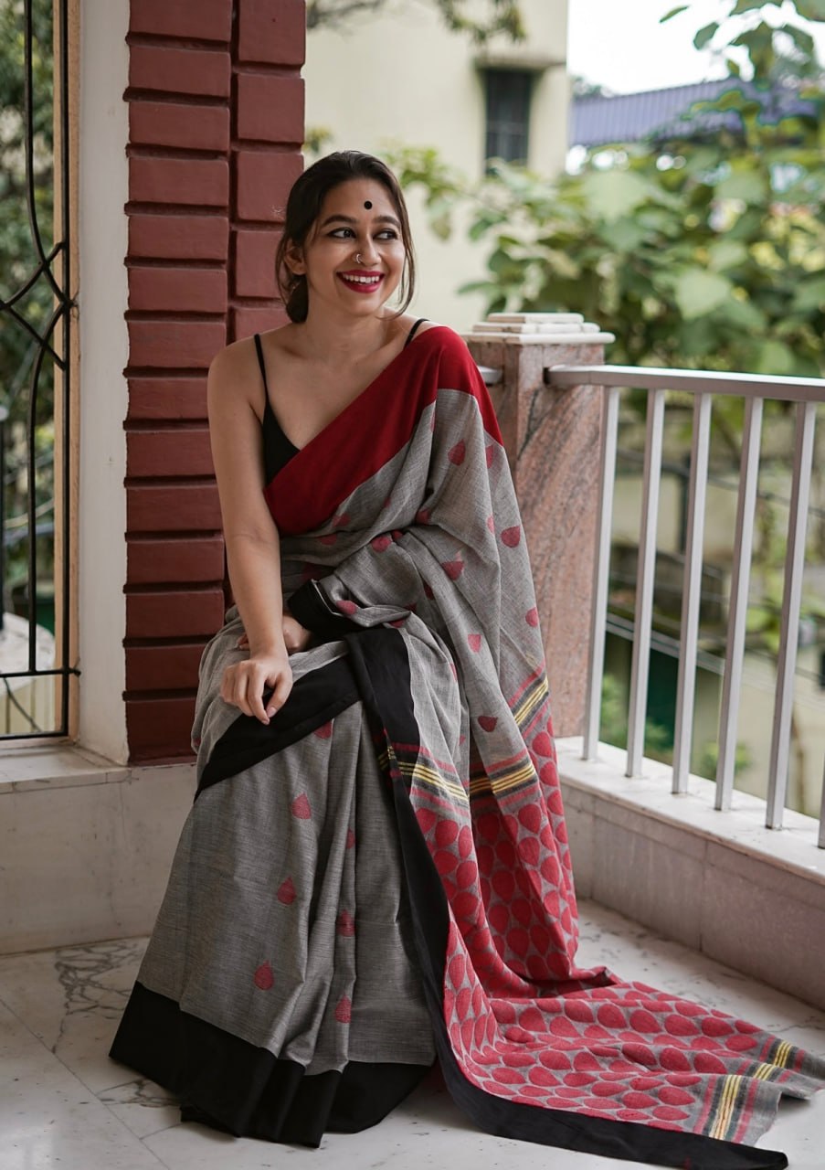 Grey & Red Printed Saree with Contrast Border and Artistic Motifs