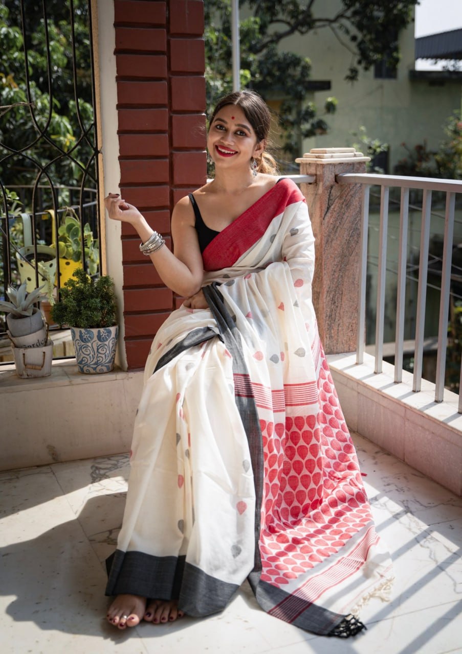 Off-White Saree with Red Abstract Print & Contrast Black Border