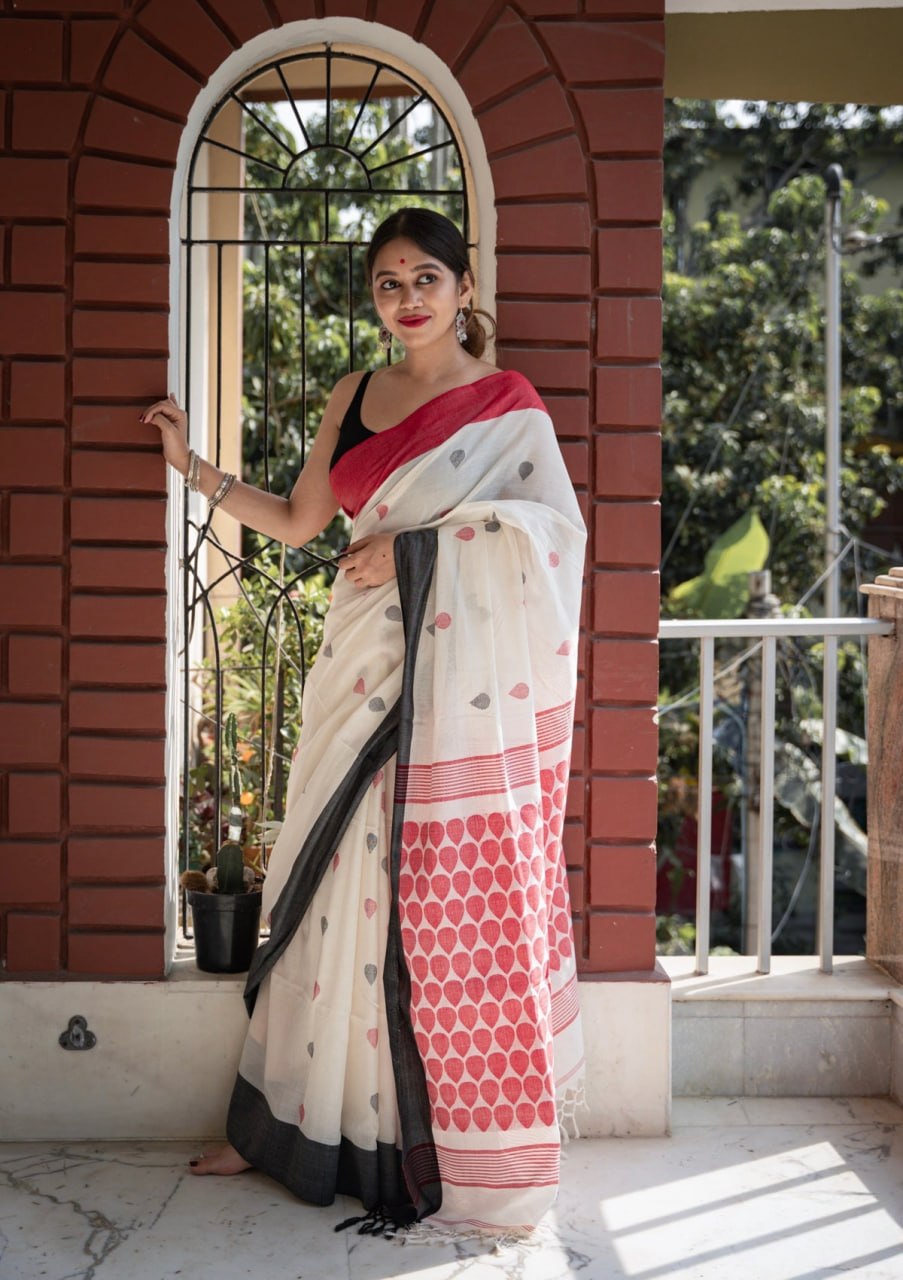 Off-White Saree with Red Abstract Print & Contrast Black Border