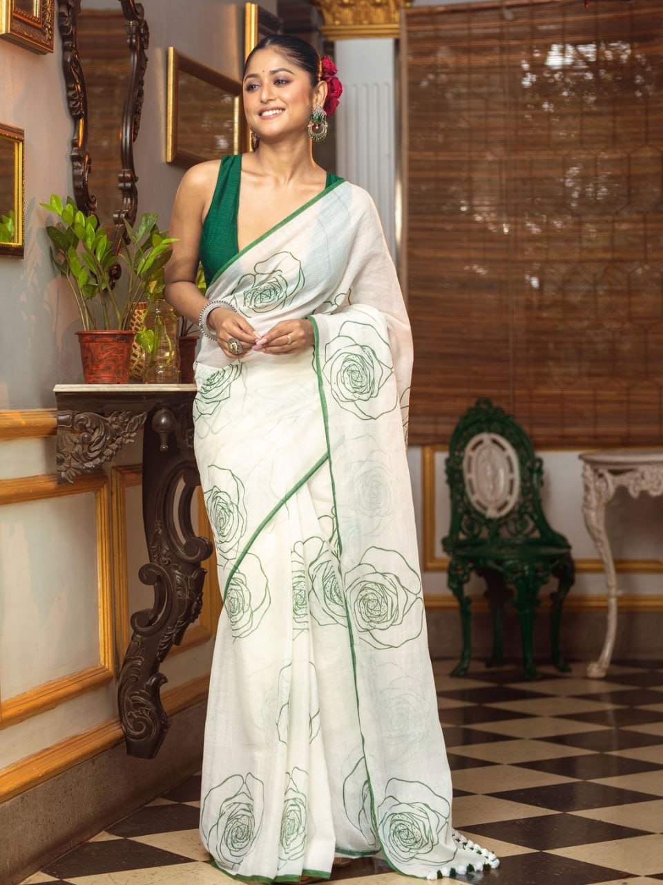 Elegant White Saree with Green Floral Line Print & Minimal Border