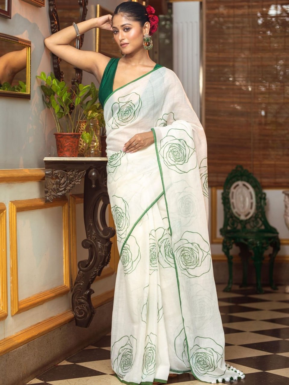 Elegant White Saree with Green Floral Line Print & Minimal Border
