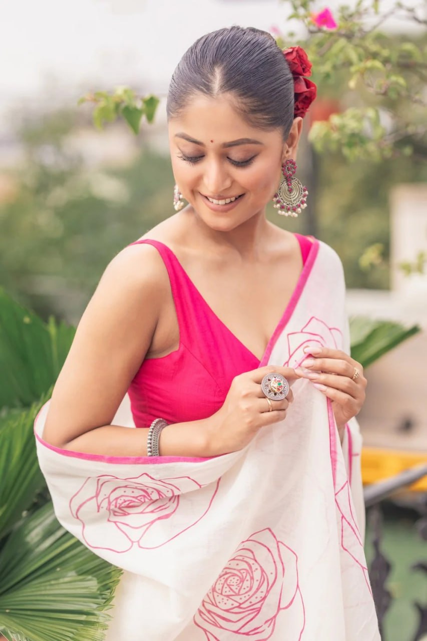 Elegant White Saree with Pink Floral Line Print & Minimal Border