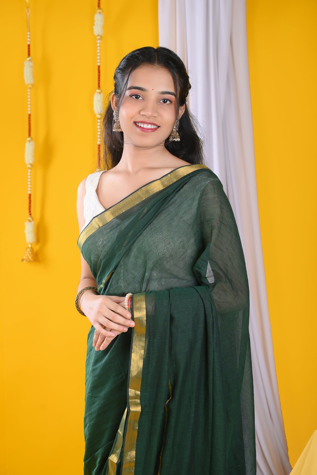 Bottle Green Mul Mul Cotton Saree with Golden Border &Ready Wear Ivory Blouse