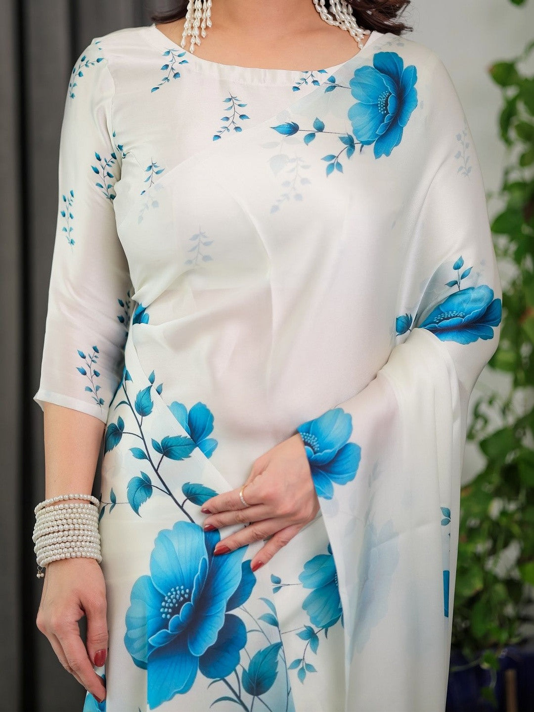 White Heavy Georgette Silk Saree with Blue Floral Print & Unstitched Blouse