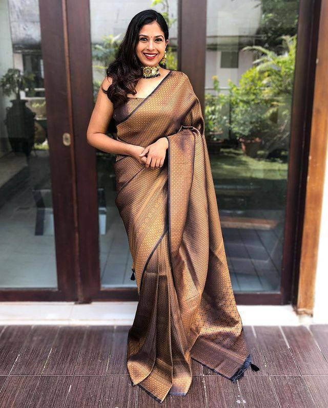 Black and Antique Gold Woven Silk Blend Saree with Tasselled Pallu