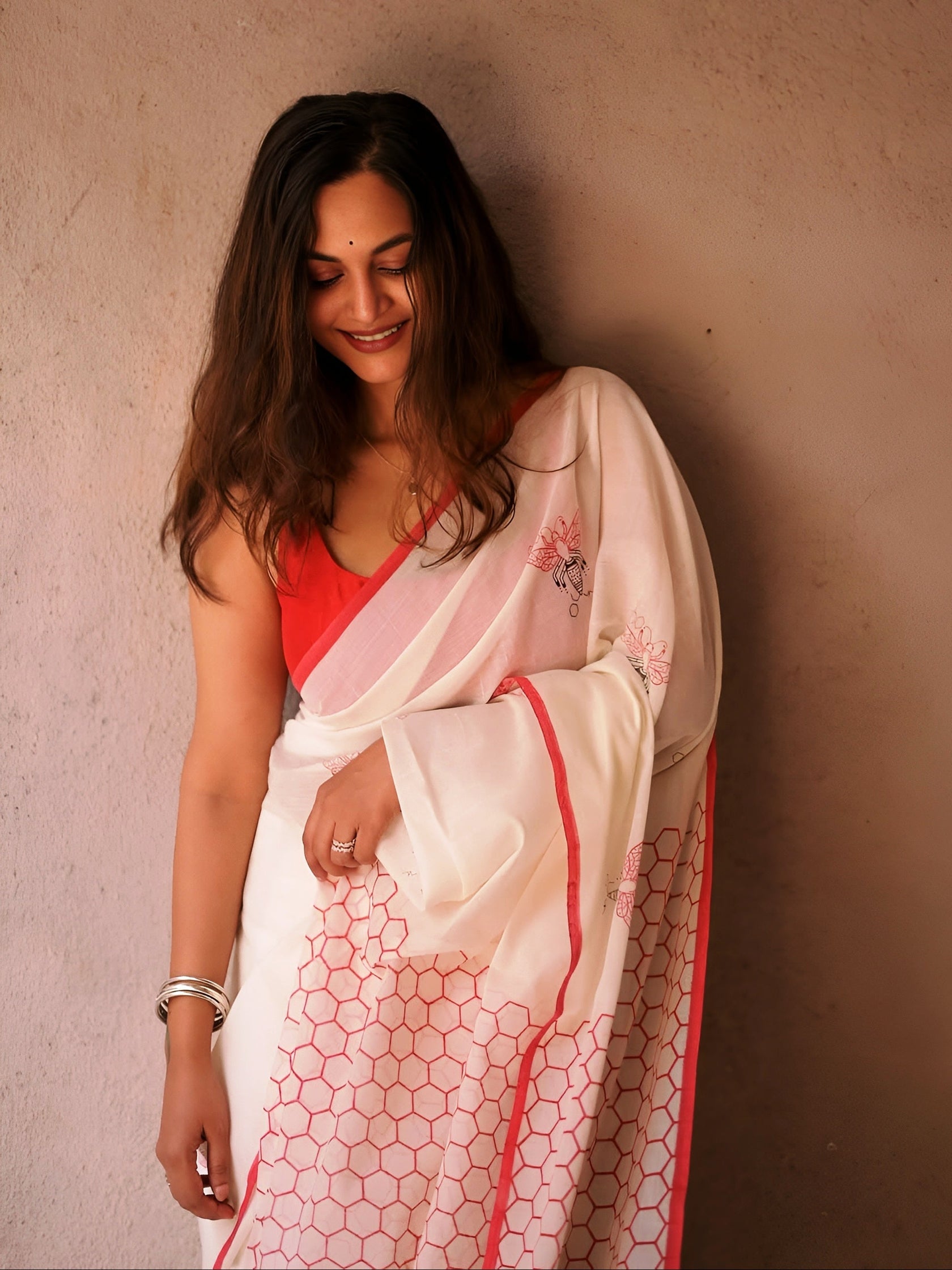Elegant Cream Linen Cotton Saree with Minimal Floral Print & Red Contrast Border