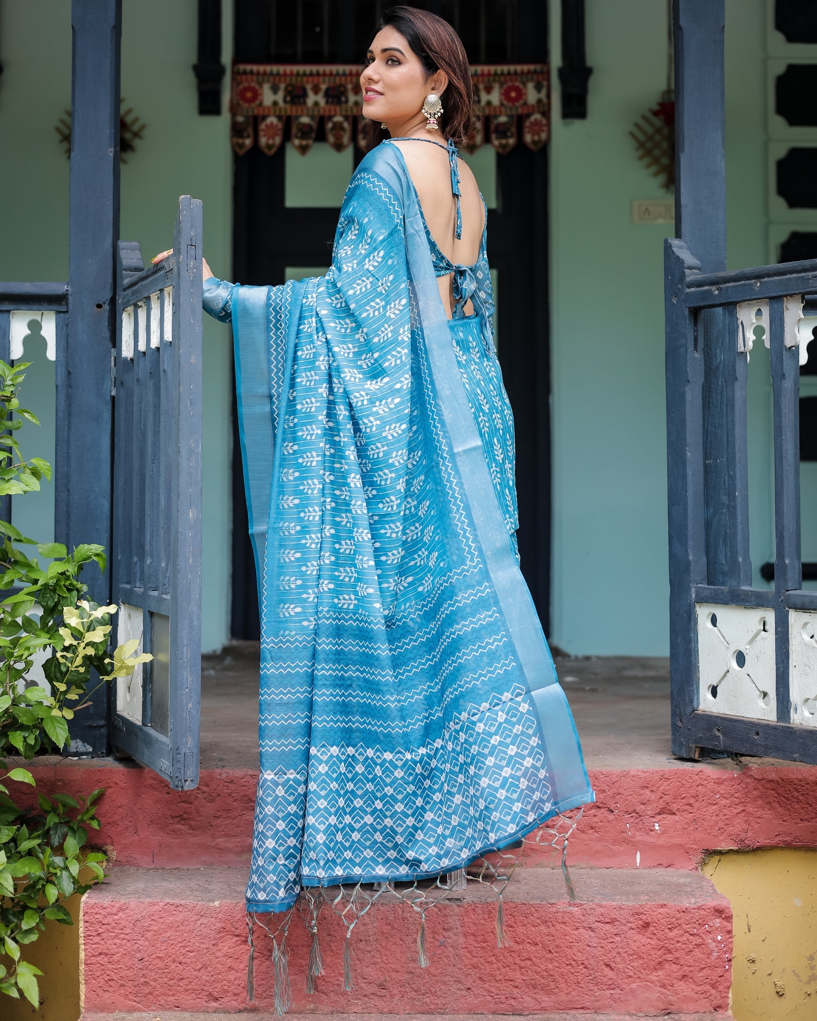 Elegant Sky Blue Printed Cotton Saree with Traditional Border Design