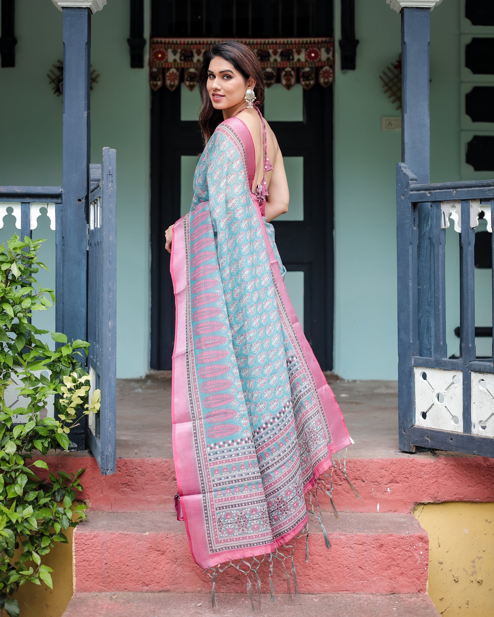 Elegant Teal Linen Cotton Saree with Pink Printed Border & Ethnic Motifs