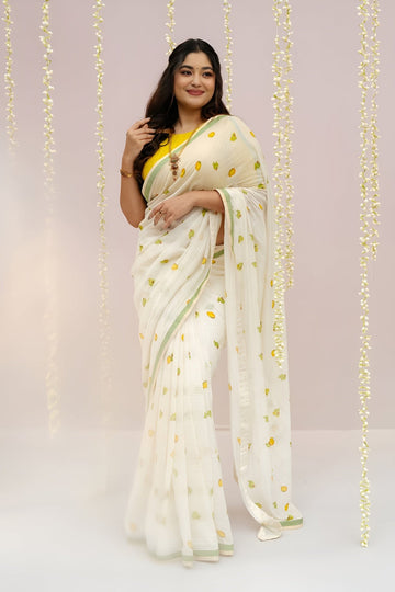 Elegant Off-White Linen Cotton Saree with Parrot Motif & Pastel Green Border