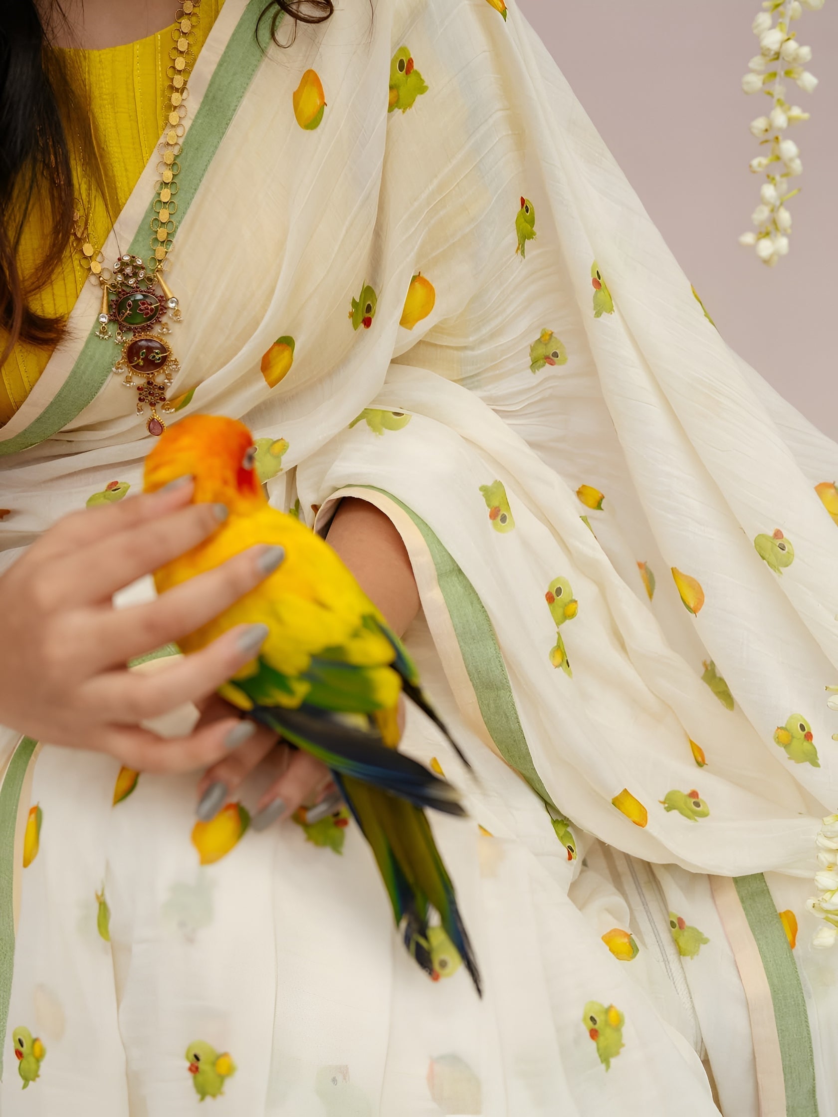 Elegant Off-White Linen Cotton Saree with Parrot Motif & Pastel Green Border