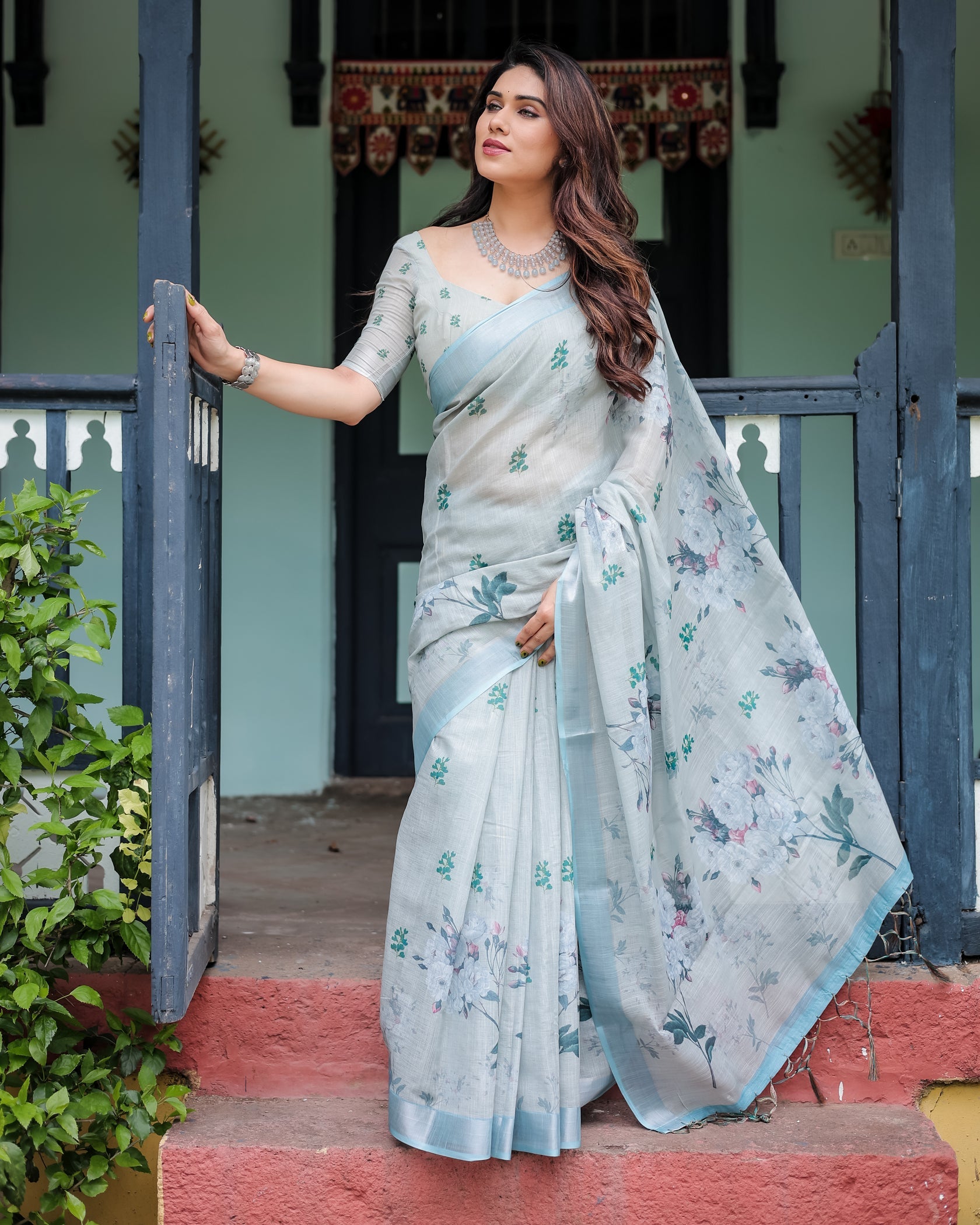 Elegant Mint Green Linen Cotton Saree with Soft Floral Print & Pastel Border