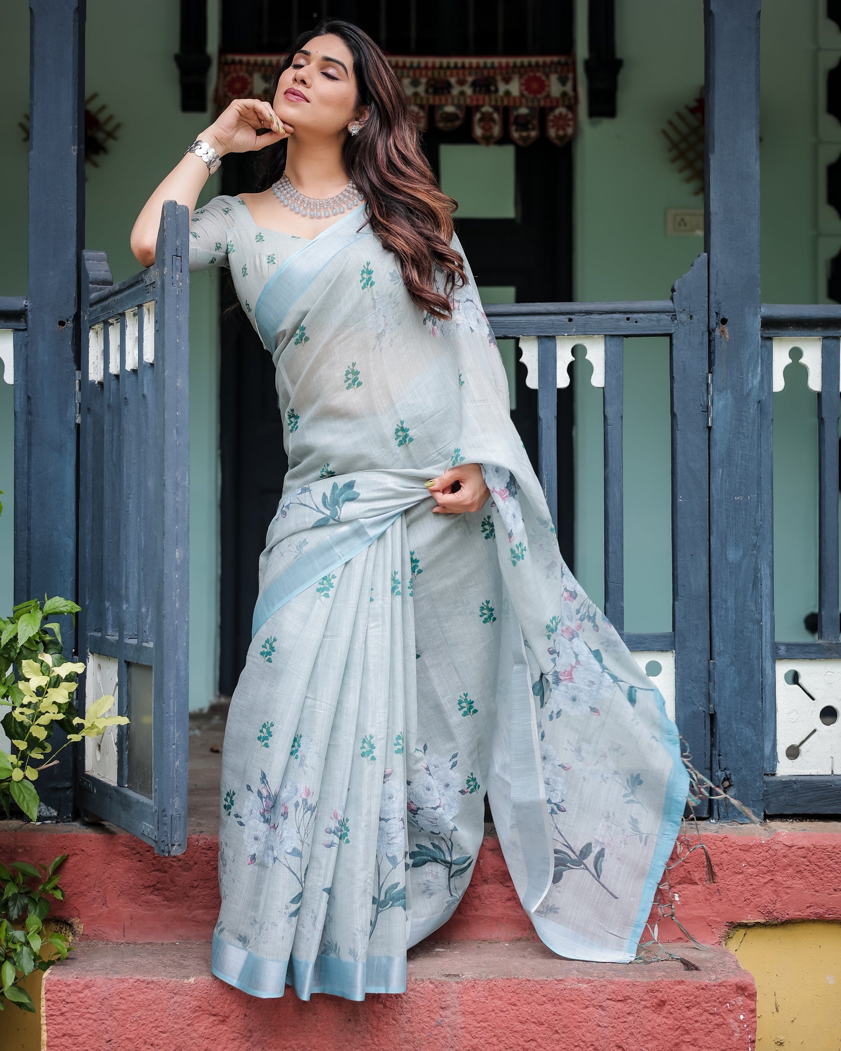 Elegant Mint Green Linen Cotton Saree with Soft Floral Print & Pastel Border