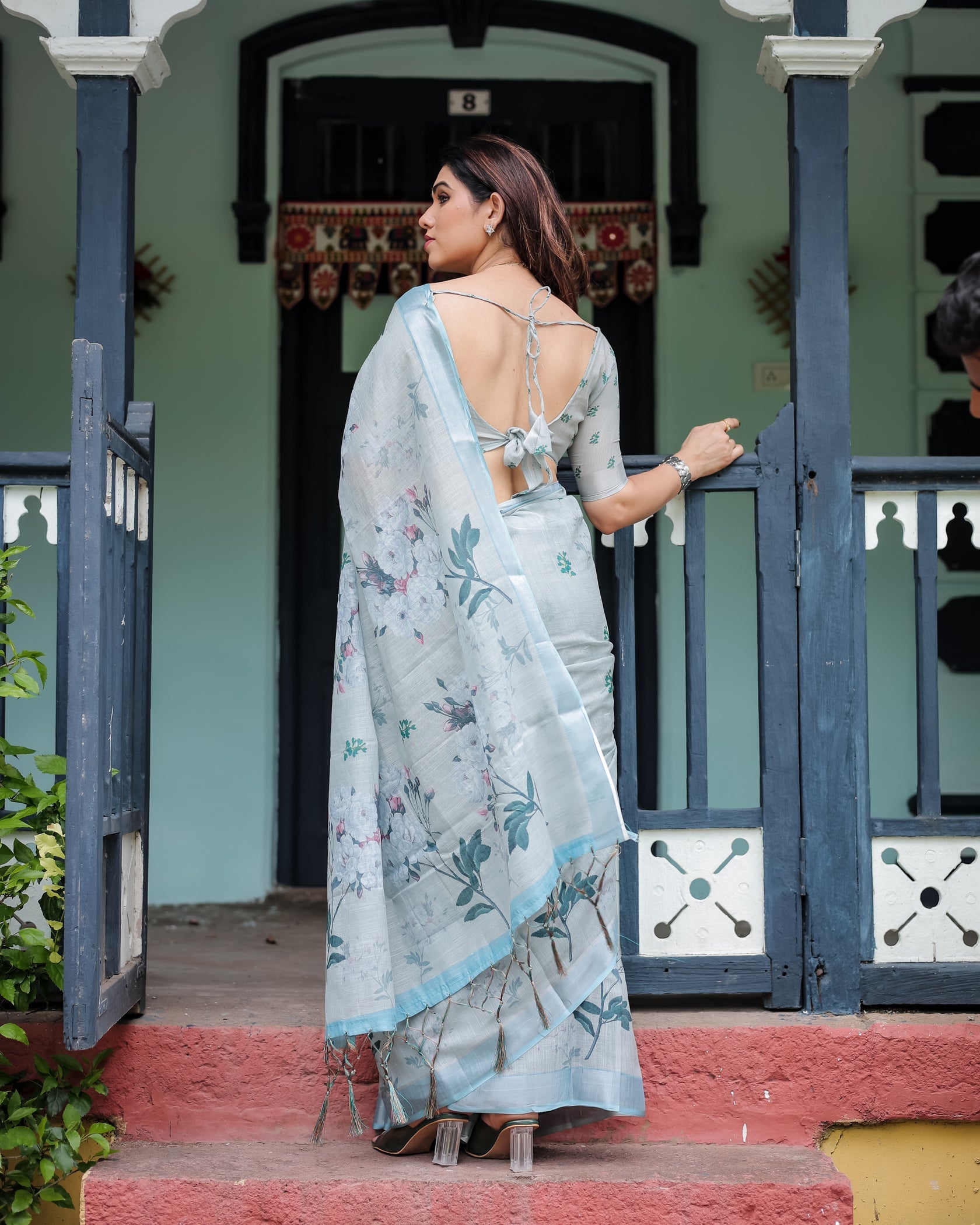 Elegant Mint Green Linen Cotton Saree with Soft Floral Print & Pastel Border