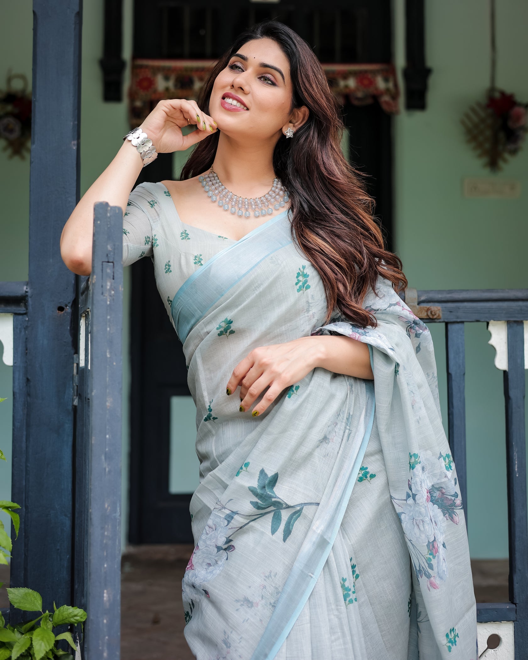 Elegant Mint Green Linen Cotton Saree with Soft Floral Print & Pastel Border