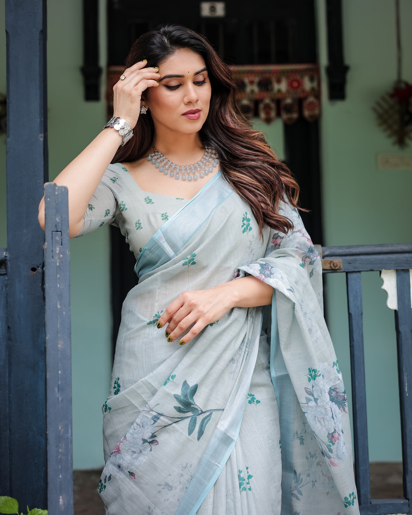 Elegant Mint Green Linen Cotton Saree with Soft Floral Print & Pastel Border