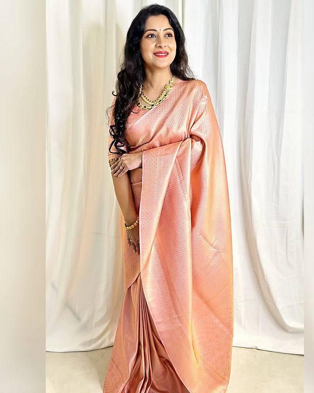 Peach Rose Gold Woven Silk Blend Saree with Subtle Traditional Motifs