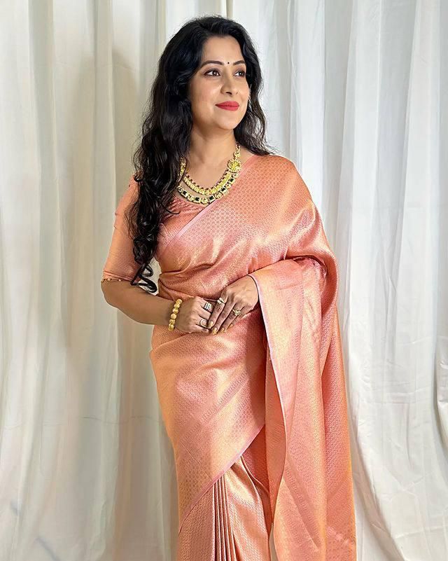Peach Rose Gold Woven Silk Blend Saree with Subtle Traditional Motifs