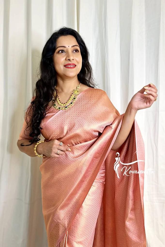 Peach Rose Gold Woven Silk Blend Saree with Subtle Traditional Motifs