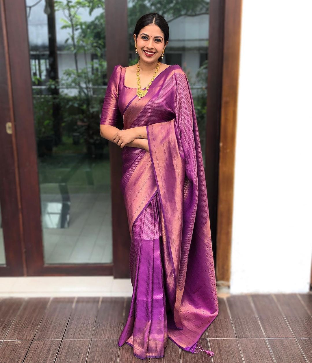 Royal Purple Woven Silk Blend Saree with Rose Gold Border and Tasselled Pallu