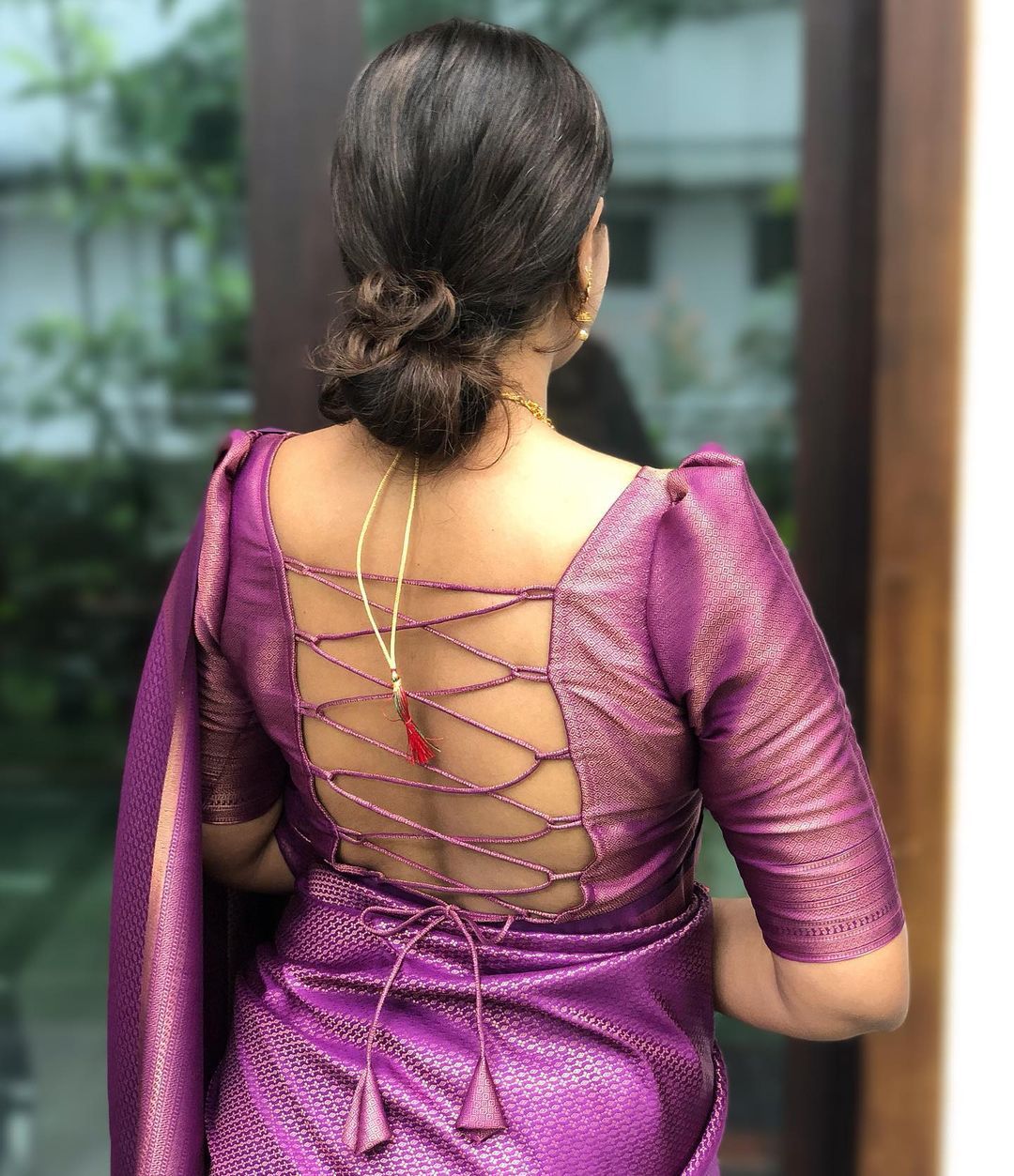 Royal Purple Woven Silk Blend Saree with Rose Gold Border and Tasselled Pallu
