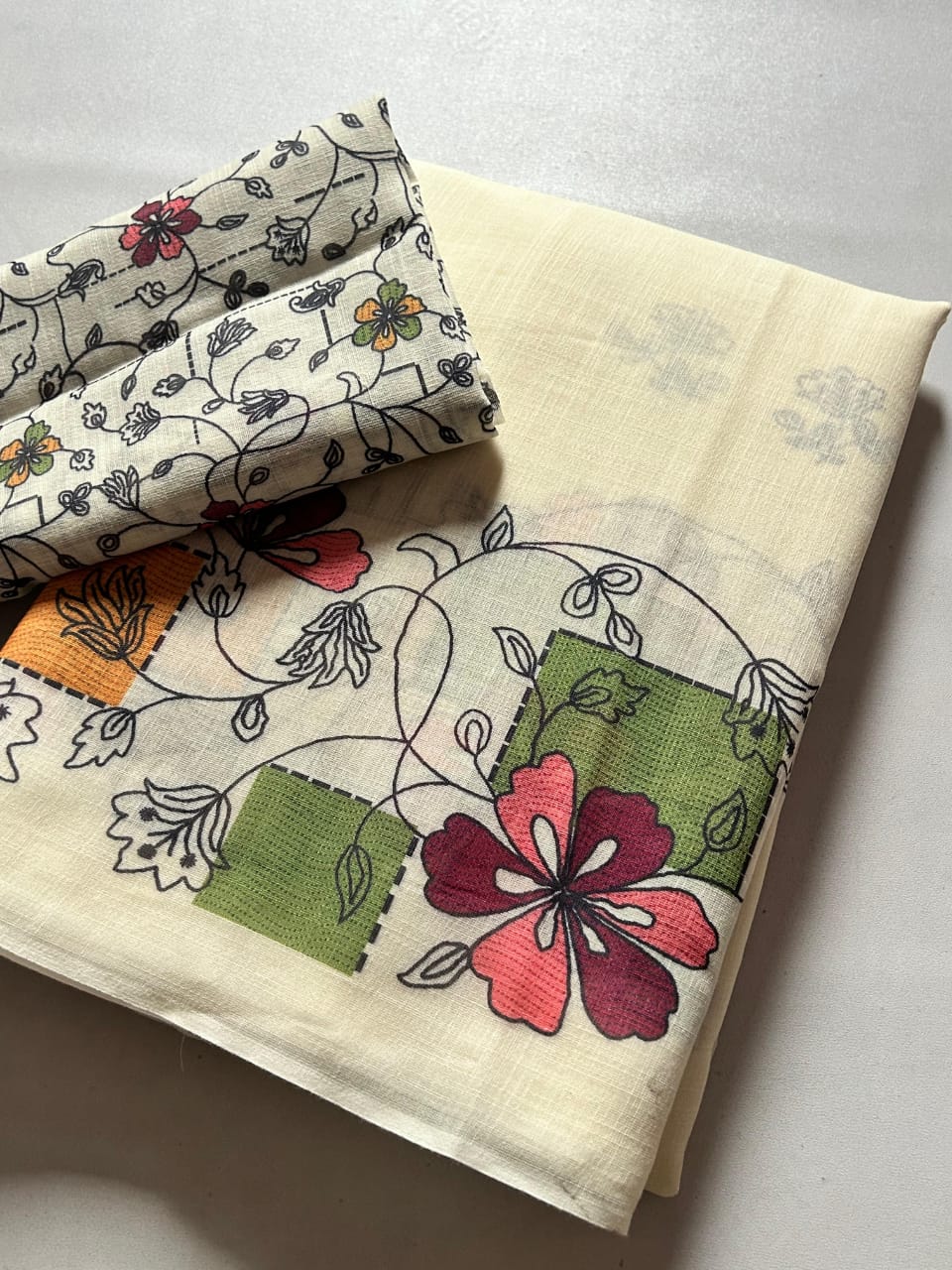 Soft Ivory Linen Saree with Pastel Floral Border