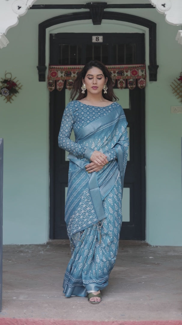 Elegant Sky Blue Printed Cotton Saree with Traditional Border Design